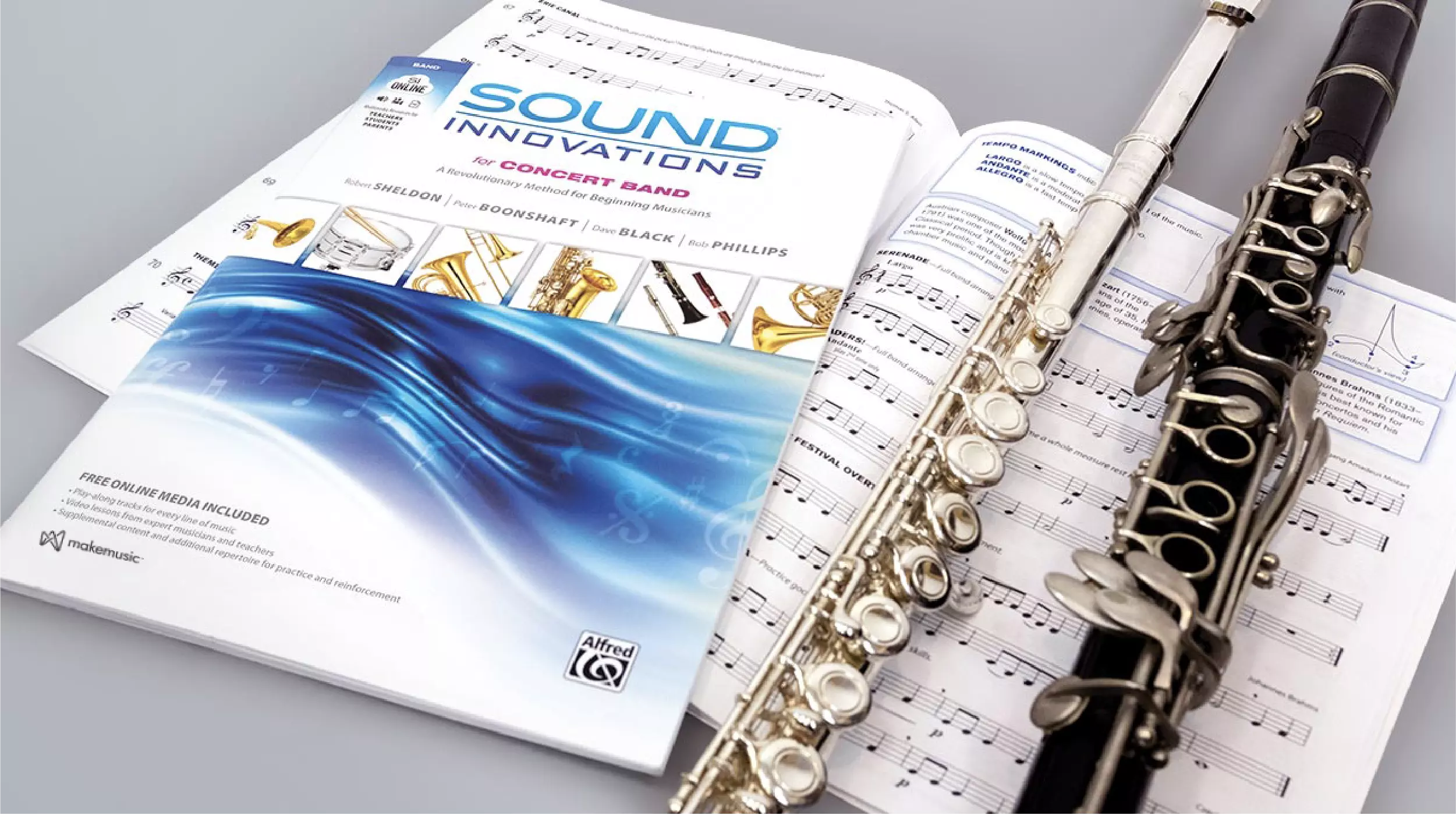 teacher in front of a laptop with easy enroll and LMS sync features highlighted